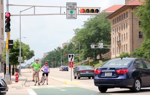 Bikers Beware two cyclists at photo and state