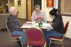 A student from Madison's Work and Learn Center talks with members of the Madison Senior Center as part of Dialogue Across the Ages, which brings generations together to discuss issues (Courtesy photo)