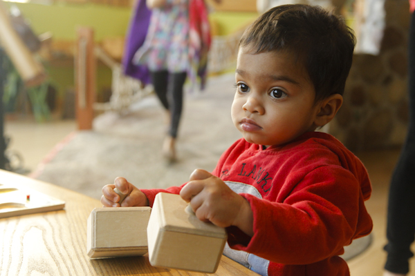 A kid plays with blocks and the Madison Childrens' Museum as part of Day in a Kids Life (Kait Vosswinkel/Madison Commons)