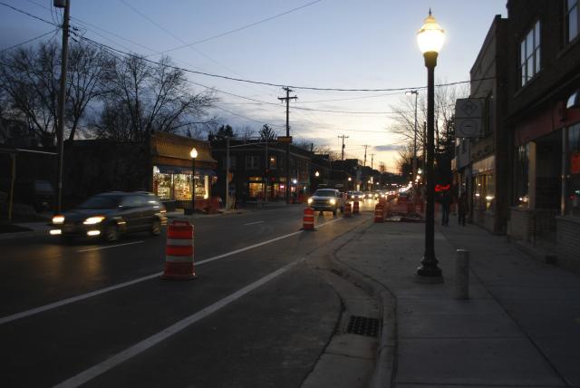 As the sun sets, traffic moves freely in both lanes of traffic along the newly paved and reconstructed Johnson Street.