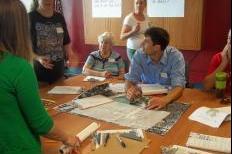 Northside residents and design team members discuss ideas for the site of an abandoned nurses' dormitory in Lake View Hill Park (Sean Kirkby/Madison Commons)