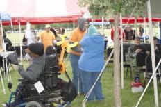 Festival attendees watch a performance at the 2013 Disability Pride Festival. The 2014 event is Saturday at Brittingham Park (Photo: Cheryl Cheryl Schiltz)