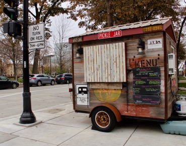 articipants on Madison Eats Food Tours sample homemade pies at the Pickle Jar food cart (Daniella Byck/Madison Commons).