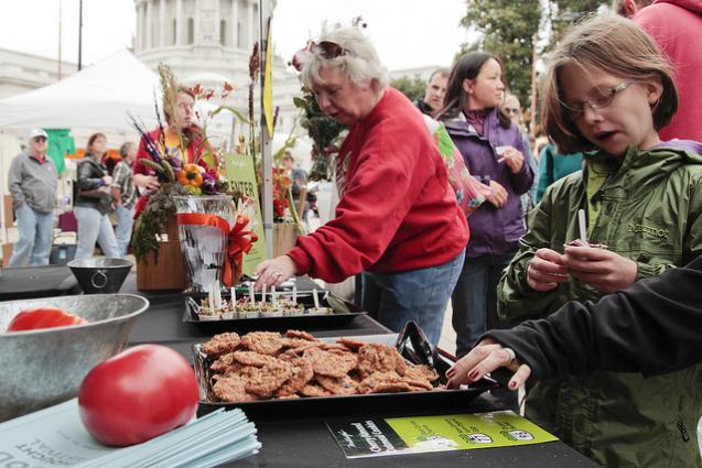 Metcalfe's Market provided samples of kale and apple salad and cherry almond oatmeal cookies, which were made with local and organic ingredients, at REAP's Food for Thought Festival on Saturday (Kait Vosswinkel/Madison Commons)