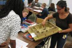 Kadakia teaching students about Guinea, photo by Kevin Schneider