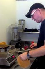 Steve Heaps, co-owner of Chocolate Shoppe Ice Cream on State makes waffle cones.