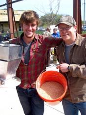 Dennison (left) and Austin ground grain for beer brewing.