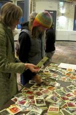 Attendees Courtney Berner and Anna Cates choose free seed packets