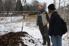 Lapham garden coordinator Jim Hansen with TEENWorks employee Derrick McDaniel