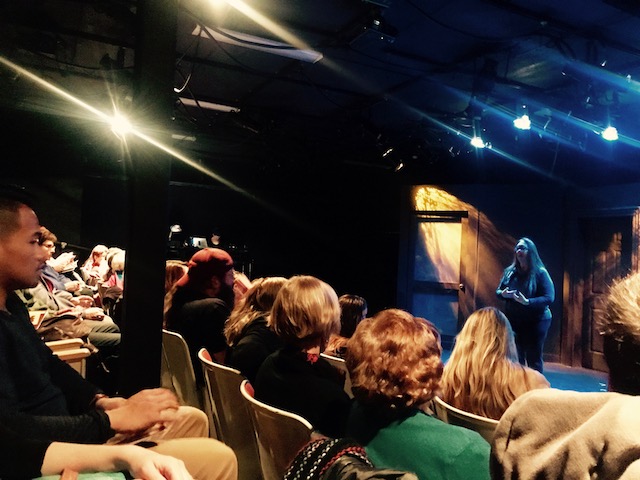 Kathie Rasmussen Women’s Theatre’s Artistic Director and co-founder, Jan Levine Thal, addressing the audience before their production of Paula Vogel’s The Mineola Twins in October 2017 (Maki Watanabe/Madison Commons).