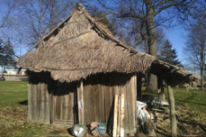 A traditional Hmong house adjacent to Kajsiab House, a community center that focuses on mental health treatment for Hmong individuals. (Lisa Speckhard/Madison Commons)