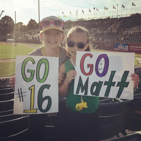 (The Blackburn’s daughters Addison (left) and Nora (right) holding up signs for their favorite Duck, Matt Horkey)