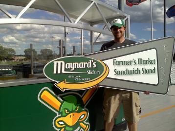 Chef Straub with the sign for the new stand