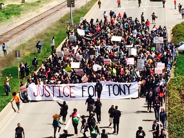 Protestors marched down John Nolen Drive Wednesday in response to a decision by Dane County District Attorney Ismael Ozanne not to charge Madison Police Office Matt Kenny in the Mar. 6 shooting death of 19-year-old Tony Robinson (photos by Franco Latona)