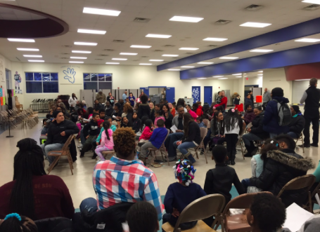 Adults and children attending an event at “Open School House Night” hosted at Aldo Leopold Elementary (Jacy Zollar/Madison Commons)