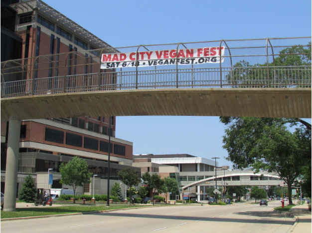 A banner on the bridge above South Park St. invites Madisonians to the 6th annual Mad City Vegan Fest this Saturday. (Trina La Susa/Madison Commons)