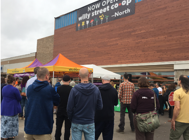 Northside community members gather outside for the Grand Opening ceremony. (Melissa Behling/Madison Commons)