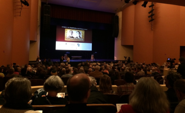 The stage was set with two lone stools and purple light as audience members waited for Kim and Occhiogrosso to come on stage. (Claire VanValkenburg/Madison Commons)