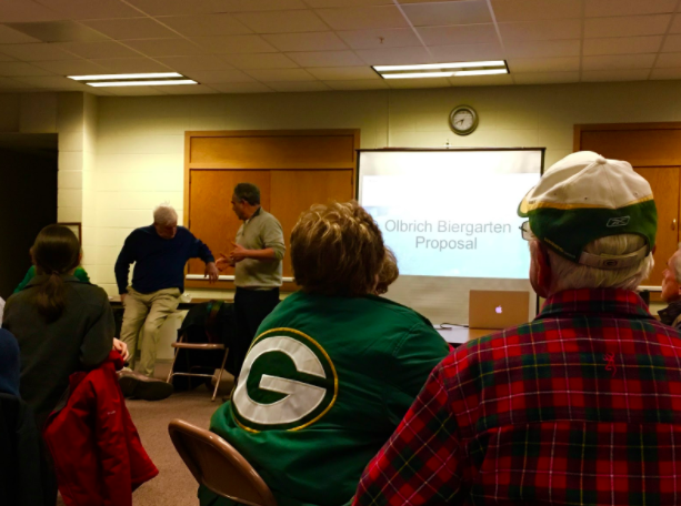 The owner of a proposed beer garden in Olbrich Park answered questions for District 15 residents at the community meeting. (Maija Inveiss/Madison Commons)