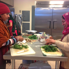 Sikh worshipers cooking together