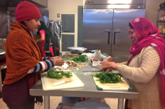 Sikh worshipers cooking together