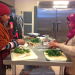 Sikh worshipers cooking together