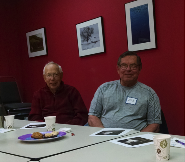 Participants in the “Meeting of the Minds” program talk and laugh together. (Lisa Speckhard/Madison Commons)