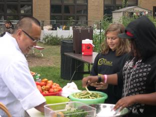Chef Tory, with students at Sherman Middle School: Credit: Ginny Hughes