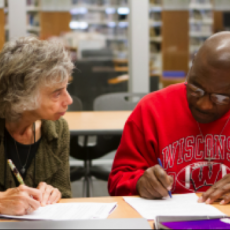 An adult learner receives tutoring at the Literacy Center. (Literacy Center)