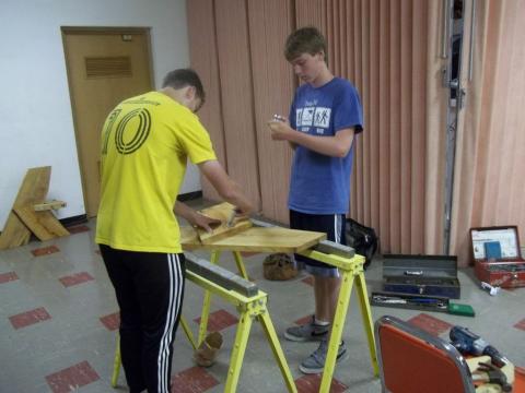 Boy Scouts build a bench out of urban wood