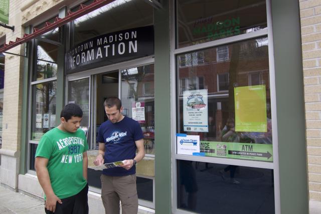 Visitors pick up the map from the Downtown Visitor Center. (Stephanie Jean Tsang/Madison Commons)