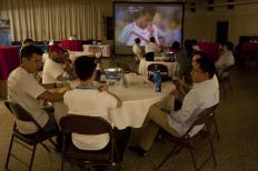 Fans watch soccer during a viewing party at St. James School in Madison. The party marked the beginning of a new partnership between the Latino Chamber of Commerce and Good Shepherd Parish (Kait Vosswinkel/Madison Commons)