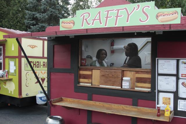 Eric Gavins and his wife prepare for customers at Raffy's Hot Dog Stand (Kait Vosswinkel/Madison Commons)