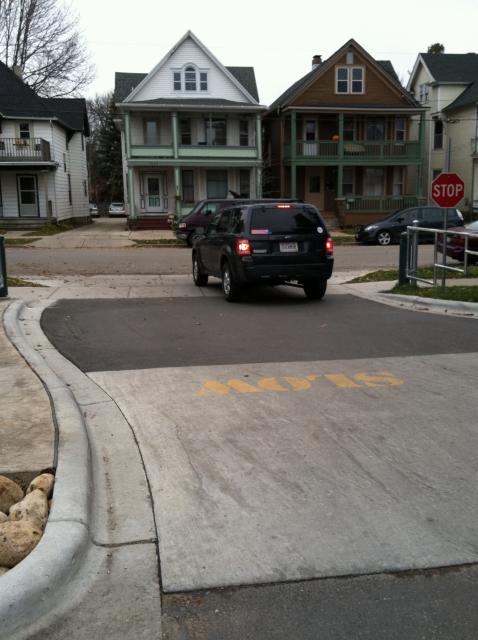 car exits driveway