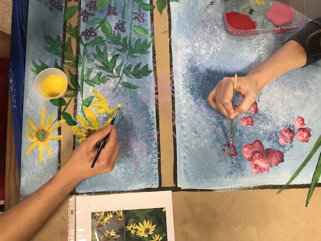 Students paint a mural for Madison's South Police Station at Hoyt School (Erin Green/Madison Commons).