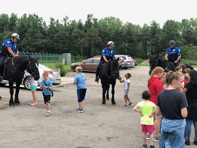 Police horses break down barriers between officers and citizens, bring community closer