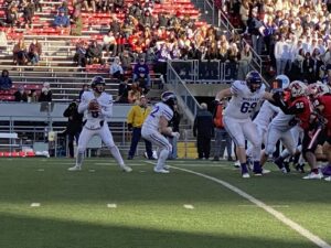 Waunakee quarterback making a pass at the state football championship.