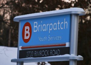 Sign for Briarpatch, a resource for youth homelessness in Dane County