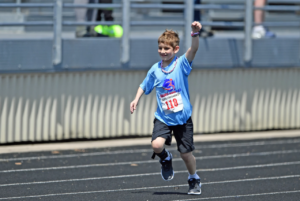 Athletes with disabilities competing in a past track race.