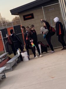 Verona players after their post-game talk with coach and cleaning the dugout