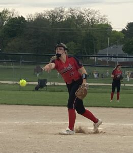 Sun Prairie pitcher, Baker throws a warmup pitch.