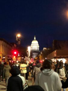 Protesters marched down State Street May 3 in support of abortion rights which Sarah Godlewski addressed in her campaign ad