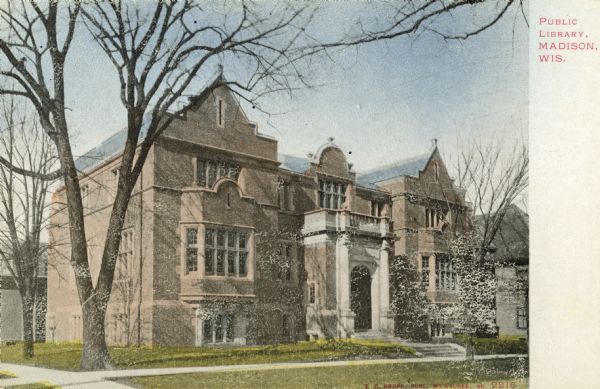 A postcard depicts the Madison Free Library, which opened as a Carnegie Library in 1906. Its name was changed to the Madison Public Library in 1959.