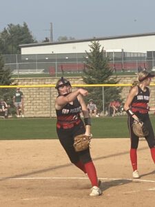 Sun Prairie’s Baker throwing a warm up pitch in between innings