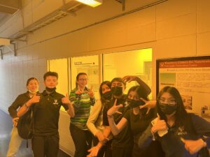 Wright Middle School students pose at the Wisconsin Centers for Nanoscale Technology. 