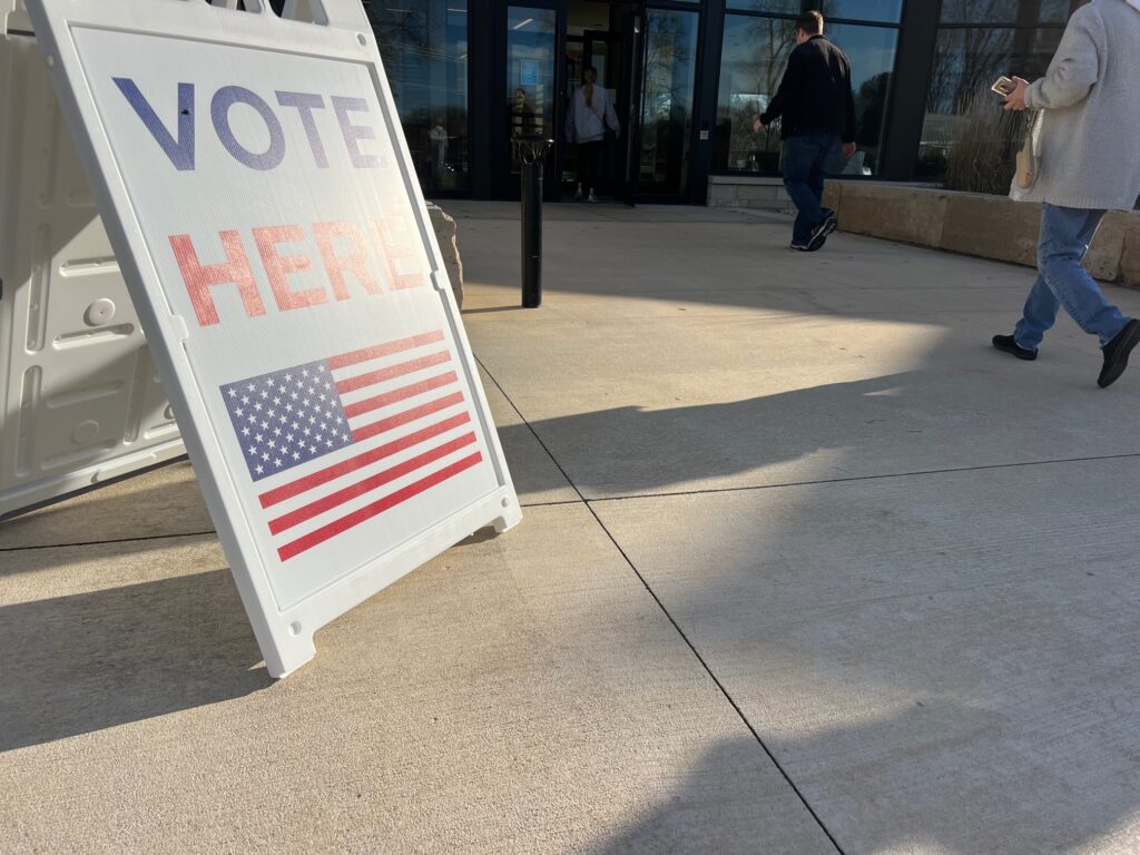 Voters enter a polling place in the Madison suburb of Waunakee.