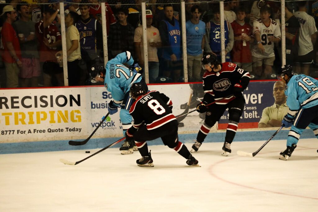 The Madison Capitols held off the Chicago Steel to win 7-6 in their season opener at Capitol Ice Arena in Middleton.