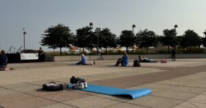 Mats are set out in preparation for Joan Herzing's rooftop yoga class