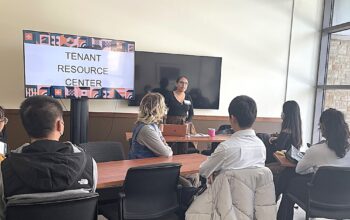 Members of the Tenant Resource Center convene at a meeting.