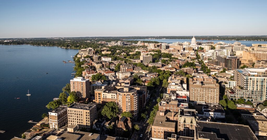 The UW campus, Madison skyline, Lake Mendota and Lake Monona are photographed looking east down Lagdon and State Streets on June 10, 2024. (Photo by Bryce Richter / UW–Madison)